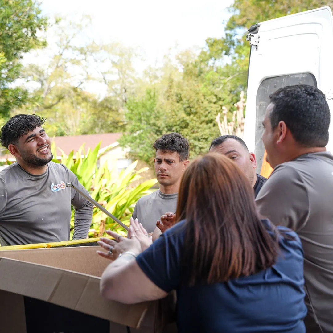 Rolando's HVAC team installing a new air conditioning system in Tampa